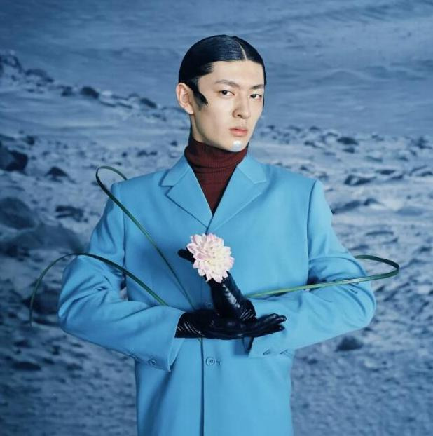 马克华菲logo含义【马克华菲logo海豚】