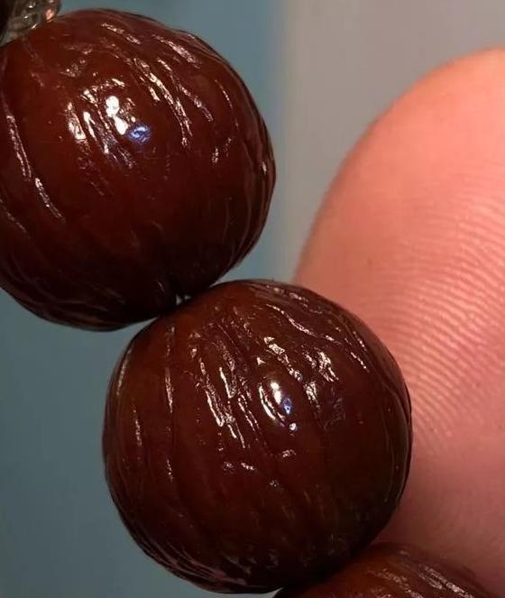 猴头核桃手串怎么盘红的快【文玩核桃猴头怎么盘红的快】