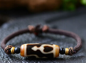 如何鉴定九眼天珠【如何鉴别九眼天珠】