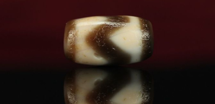 如何鉴定九眼天珠【如何鉴别九眼天珠】