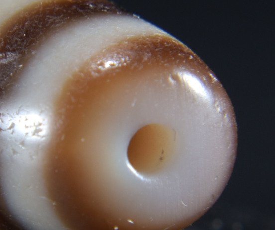 如何鉴定九眼天珠【如何鉴别九眼天珠】